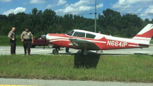 A plane landed on U.S. 441 in Jackson County on Tuesday. (Credit: Channel 2 Action News)