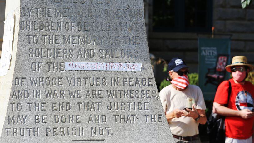 Protesters made a temporary alteration to the Confederate monument in Decatur Square on June 3 in Decatur. Peaceful protesters gathered in the square to protest the death of Georgia Floyd, an unarmed black man in Minnesota. CHRISTINA MATACOTTA FOR THE ATLANTA JOURNAL-CONSTITUTION