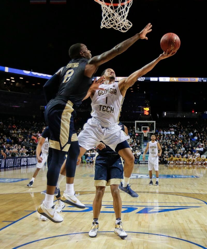  Georgia Tech guard Tadric Jackson (1) puts up a shot against Pittsburgh forward Michael Young (2) during the first half of an NCAA college basketball game in the first round of the ACC tournament, Tuesday, March 7, 2017, in New York. Pittsburgh won 61-59. (AP Photo/Julie Jacobson)