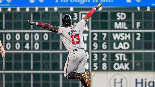 The Atlanta Braves' Ronald Acuna Jr. (13) celebrates after hitting a solo home run in the fifth inning against the Houston Astros at Minute Maid Park on Wednesday, April 17, 2024, in Houston. (Logan Riely/Getty Images/TNS)