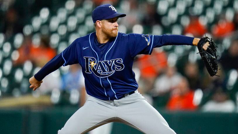 Tampa Bay Rays relief pitcher Collin McHugh throws a pitch to the Baltimore Orioles during the sixth inning of a baseball game, Tuesday, May 18, 2021, in Baltimore. (AP Photo/Julio Cortez)