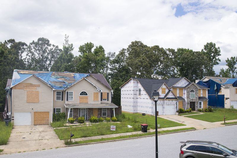 07/02/2018 — Fairburn/South Fulton, GA - Construction on houses in the Chestnut Ridge subdivision is ongoing following a March tornado in South Fulton, Monday, July 2, 2018. A tornado ripped through the subdivision in March 2018. Some residents displaced by the weather moved in with other family members, sheltered in hotels or rented another house. ALYSSA POINTER/ALYSSA.POINTER@AJC.COM