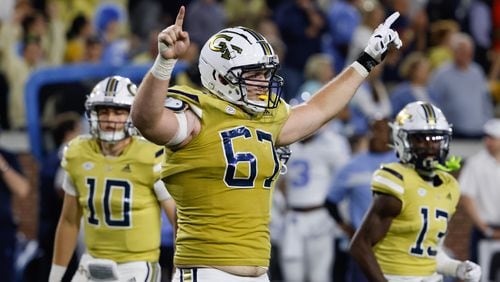 Georgia Tech Yellow Jackets offensive lineman Joe Fusile (67) celebrates their go ahead touchdown during the fourth quarter of an NCAA football game In Atlanta on Saturday, Oct. 28, 2023 between the Georgia Tech Yellow Jackets and the North Carolina Tar Heels.  Georgia Tech won, 46-42.  (Bob Andres for the Atlanta Journal Constitution)