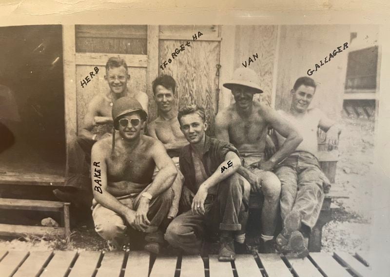Army Cpl. Robert Ford, center, while serving in World War II. Ford was stationed on the Pacific island of Saipan was was one of the troops set to invade Japan.