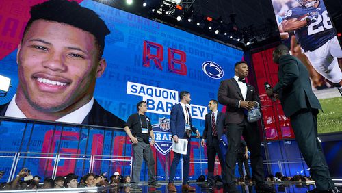 The Penn State running back Saquon Barkley is selected by the New York Giants with the second pick of the 2018 NFL Draft, at AT&T Stadium in Arlington, Texas, April 26, 2018. (Cooper Neill/The New York Times)