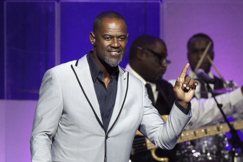FILE - This June 5, 2015 file photo shows singer Brian McKnight performing at the Wal-Mart shareholder meeting in Fayetteville, Arkansas. (AP Photo/Danny Johnston, File)