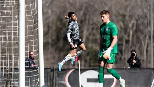 Luiz Araujo, a forward for Atlanta United, celebrates a goal Sunday against the Revolution. Atlanta United defeated the Revolution 4-0 in exhibition game  at the Turner Soccer Complex on the campus of the University of Georgia.
.