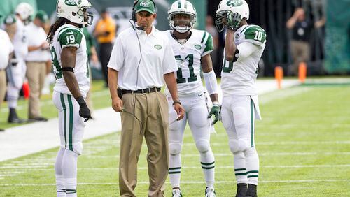 Sanjay Lal looks on with New York Jets wide receivers Clyde Gates, Jeremy Kerley and Santonio Holmes, during a game against the Tampa Bay Buccaneers on September 8, 2013 at MetLife Stadium in East Rutherford, N.J. (Christopher Szagola/Cal Sport Media/Zuma Press/TNS)