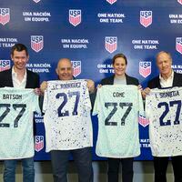 Members of U.S. Soccer, CEO JT Watson (left) and President Cindy Parlow Cone (second from right) hold No. 27 jerseys with members of Mexican Soccer Federation, President Commissioner Juan Carlos Rodriguez (second from left) and Executive President Ivar Sisniega (right) during a visit at Mercedes-Benz Stadium, Monday, Feb. 26, 2024, in Atlanta. (Jason Getz / jason.getz@ajc.com)