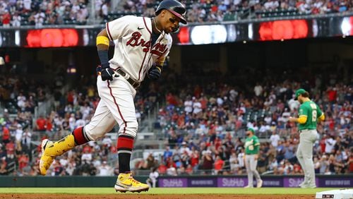 Atlanta Braves outfielder Ronald Acuna rounds third base hitting a solo homer against the Oakland Athletics during the first inning of a MLB baseball game on Tuesday, June 7, 2022, in Atlanta.    Curtis Compton / Curtis.Compton@ajc.com