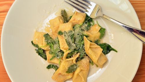 The pi fasacc at Storico Fresco are little envelopes of pasta, folded pockets of lightly salty cheeses just touched with herbs, tossed in butter browned with sage and topped with a wilted little pile of spinach. (Chris Hunt / special)