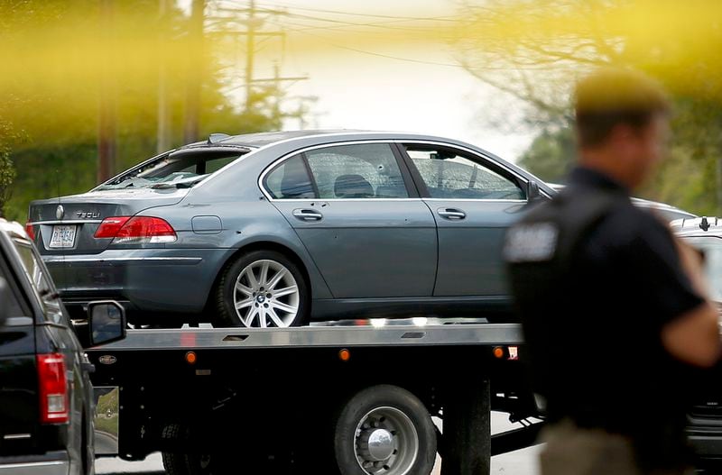 The car involved in Wednesday's police-involved shooting in Elizabeth City, North Carolina, is removed from the scene.