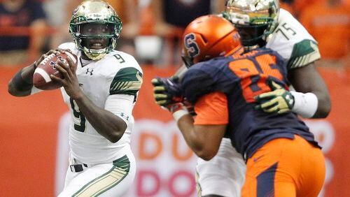 South Florida's Quinton Flowers looks to pass the ball in the second half of an NCAA college football game against Syracuse in Syracuse, N.Y., Saturday, Sept. 17, 2016. South Florida won 45-20. (AP Photo/Nick Lisi)