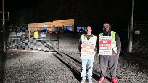 Striking workers early Friday morning. Members of Teamsters Local Union 728 who work at Republic Services’ location at 2530 Business Drive in Cumming are picketing for safer conditions.