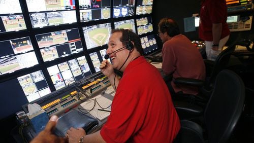 Former TBS baseball producer Glenn Diamond seated in the production booth. Diamond oversaw Braves broadcasts for 31 years, including the world championship season of 1995, before leaving for a similar job with the Los Angeles Dodgers. (Contributed photo)