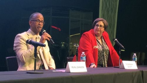 DeKalb County Tax Commissioner Irvin Johnson and attorney Susannah Scott participated in a candidate forum for the tax commissioner’s position at New Life Church on May 16. They’ll face off in a July 26 runoff election. MARK NIESSE / MARK.NIESSE@AJC.COM.