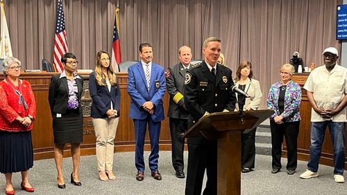 New Cobb Police Chief Stuart VanHoozer addresses the media after the Board of Commissioners voted unanimously to approve his appointment on May 10, 2022, in Marietta.
