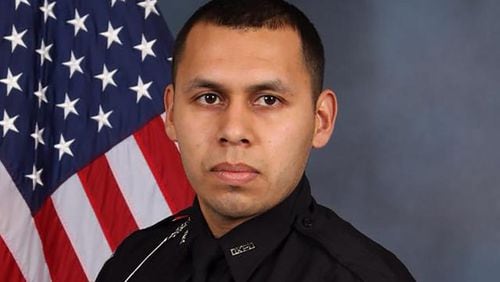 Officer Edgar Flores of the DeKalb County Police Department was killed by gunfire last week.