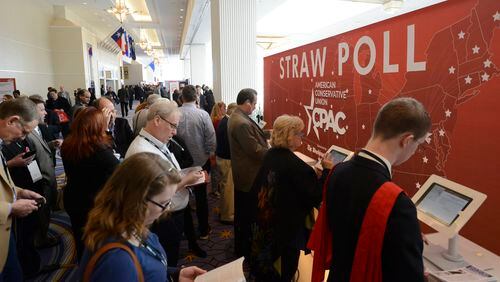 Guests queue to place their votes in an electronic straw poll for possible presidential candidates at the Conservative Political Action Conference (CPAC) in National Harbor, Md., on Feb. 28, 2015. REUTERS/Mike Theiler
