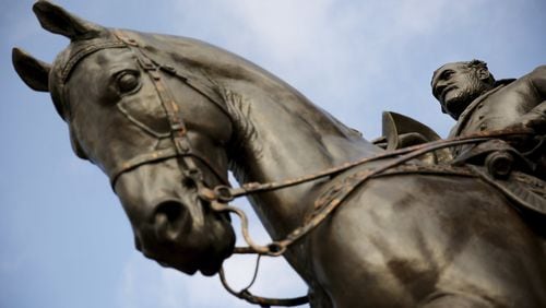 A statue of Confederate Gen. Robert E. Lee stands in Robert E. Lee Park in the Oak Lawn neighborhood of Dallas. (Andy Jacobsohn/The Dallas Morning News)