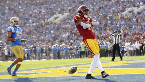 Southern California wide receiver Velus Jones Jr. celebrates his touchdown reception against UCLA during the first half of an NCAA college football game Saturday, Nov. 17, 2018, in Pasadena, Calif. (AP Photo/Marcio Jose Sanchez)