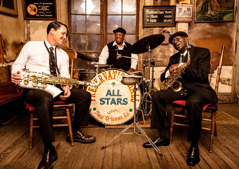 Guests of Four Seasons New Orleans can take a music lesson with members of the Preservation Hall Jazz Band.