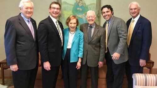 Georgia Tech athletic director Todd Stansbury, basketball coach Josh Pastner and senior associate athletic director Jack Thompson visited former President Jimmy Carter and his wife, Rosalynn, at the Carter Center. Hugh Carter Jr., the son of the former President’s late cousin, facilitated the meeting. (Photo via Twitter)