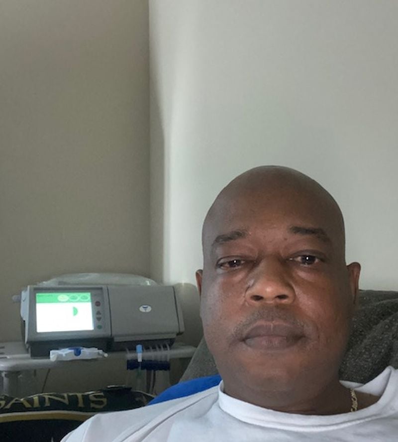 Eric Bailey receives a dialysis treatment at his Lawrenceville home in February 2021. Between his full-time job and 10-hour treatments, he says he has no time for his favorite pastimes. (Courtesy of Shannon Volkodav)