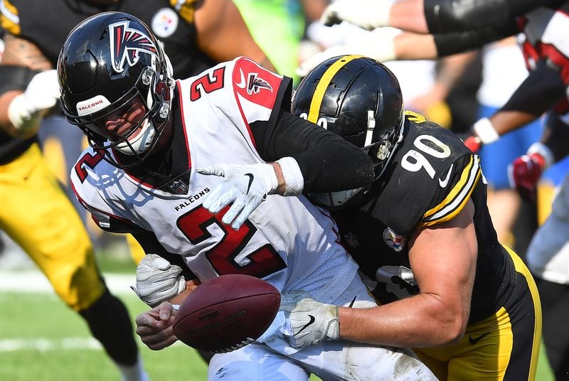 Falcons QB Matt Ryan fumbles as he is hit by T.J. Watt during Sunday's 41-17 Steelers victory in Pittsburgh. (Photo by Joe Sargent/Getty Images)