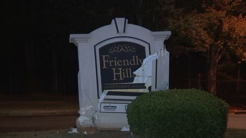 The blue vehicle that was seen leaving the scene crashed into the sign at the Friendly Hills Apartment Homes, Channel 2 Action News reported.