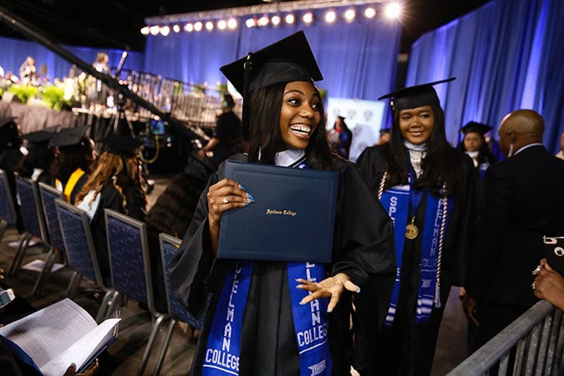 A student expresses her joy after receiving her degree at the 132nd Spelman College commencement ceremony on Sunday, May 19, 2019, at the Georgia International Convention Center. This year's commencement exercises will be held at Bobby Dodd Stadium on Georgia Tech's campus. (Photo: ELIJAH NOUVELAGE/SPECIAL TO THE AJC)