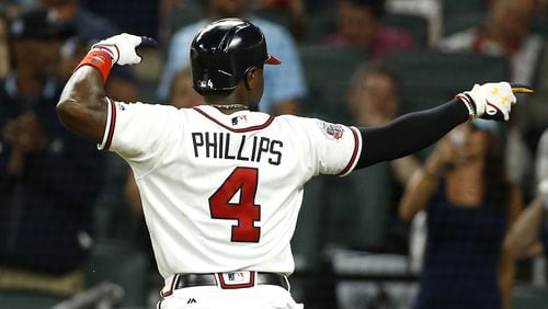 Braves second baseman Brandon Phillips acknowledges the fans after hitting a solo home run in the fifth inning against the San Francisco Giants at SunTrust Park on June 22, 2017 in Atlanta.