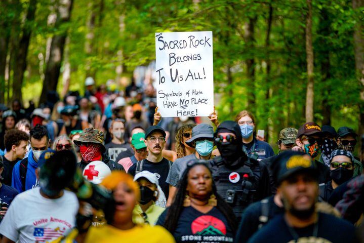 Counterprotesters march toward Stone Mountain Park. The park attractions were shut down Saturday, April 30, 2022, due to the Sons of Confederate Veterans event. (Photo: Ben Hendren for the Atlanta Journal Constitution)