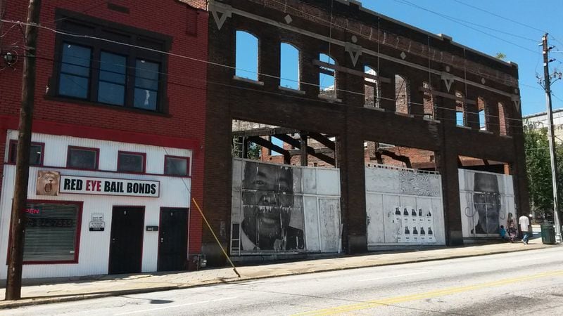 Art has been added to some buildings in south downtown Atlanta, but much of the area is only now getting more serious attention from a number of developers. MATT KEMPNER / AJC