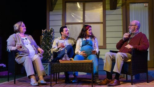 Virginia (Tracey Buot), Pablo (Braian Rivera Jimenez), Tania (Erika Miranda) and Frank (Rial Ellsworth) share a drink on the patio In "Native Gardens." Stage Door Players presents the show through April 28.