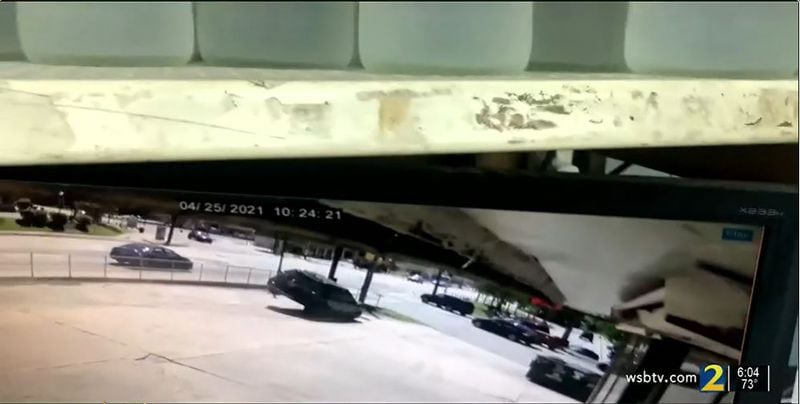 The Nissan Rogue fleeing from a state trooper can be seen speeding wildly through a parking and losing control before crashing into the sedan driven by 60-year-old William Johnson, a crash that would prove fatal.