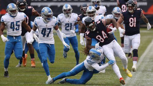 Chicago Bears wide receiver Cordarrelle Patterson (84) is tackled by Detroit Lions cornerback Mike Ford (38) after a 45-yard kickoff return to open the first quarter Sunday, Dec. 6, 2020 at Soldier Field in Chicago. (Brian Cassella/Chicago Tribune/TNS)