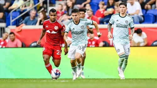Atlanta United midfielder Matheus Rossetto #20 dribbles the ball during the match against New York Red Bulls at Red Bull Arena in Harrison, NJ on Saturday June 24, 2023. (Photo by Mitchell Martin/Atlanta United)