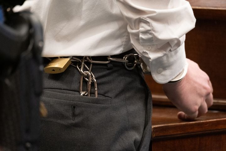 210727-Canton- Robert Aaron Long has his hands shackled to his waist as he stands before Judge Ellen McElyea in Superior Court of Cherokee County in Canton on Tuesday morning, July 27, 2021, before pleading guilty to the spa shootings. Ben Gray for the Atlanta Journal-Constitution