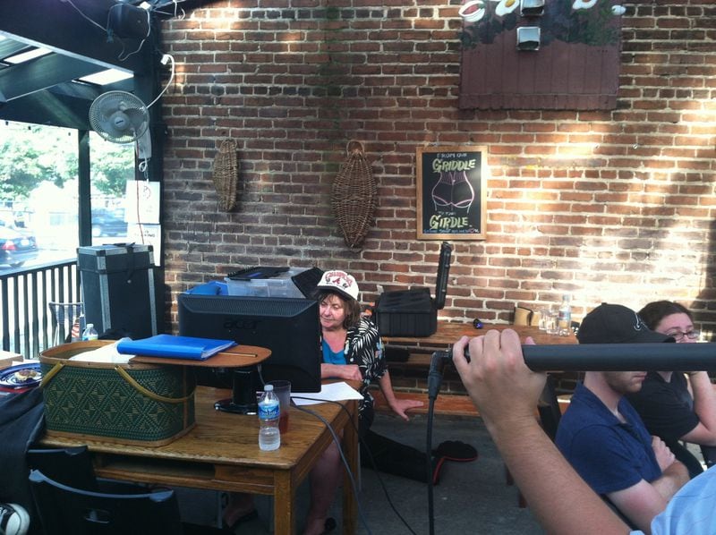 Atlanta-based filmmaker Fran Burst-Terranella checks a shot during the making of “The 12 Lives of Sissy Carlyle,” which will premiere March 27 at the Atlanta Film Festival. CONTRIBUTED BY BURST VIDEO/FILM