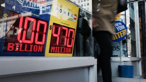A convenience store advertises the Mega Millions lottery on October 19, 2018. The jackpot for tonight's drawing has now climbed to $1 billion, making it the largest jackpot in the game's history and the first to top the $1 billion mark.