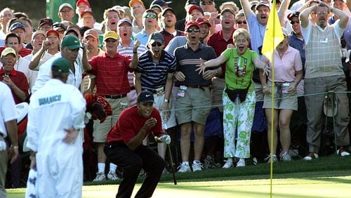It's a rich tapestry of reaction as Tiger Woods urges his chip shot to drop on No. 16 during the final round of the 2005 Masters.