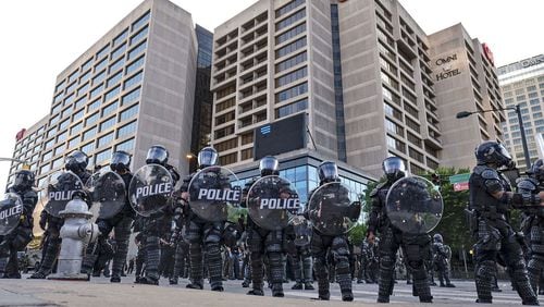 There was a heavy police presence around the CNN Center and Centennial Olympic park on May 30, 2020 as protests over the death of George Floyd in Minneapolis police custody continued for a second day. File photo. Ben Gray for the Atlanta Journal-Constitution