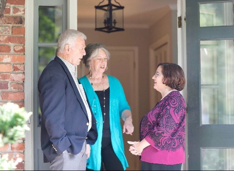 Dunwoody mayor-elect Lynn Deutsch (right) said she won the old-fashioned way by standing on prospective voters’ front porches. Photo special to the AJC
