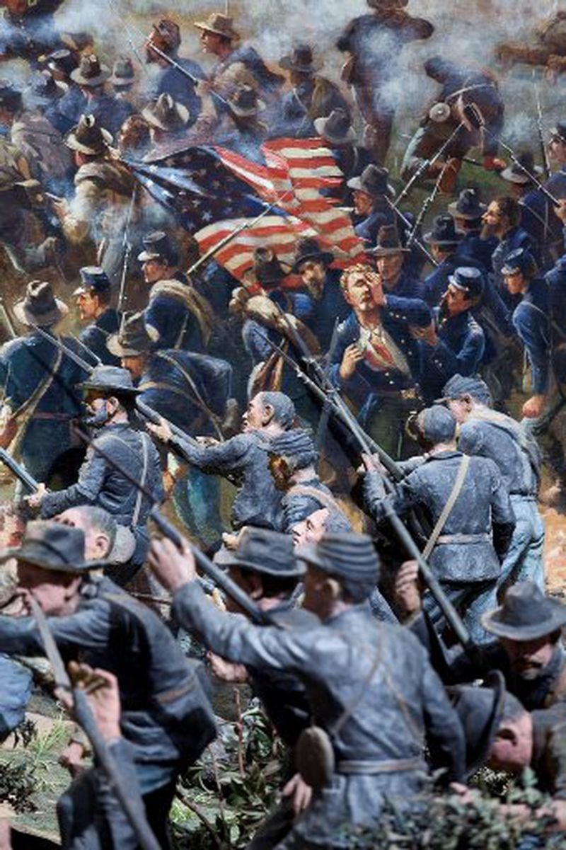 A section of the Cyclorama, the massive painting of the Battle of Atlanta, appears behind some of the three-dimensional figures in the diorama that serves as the painting's foreground.