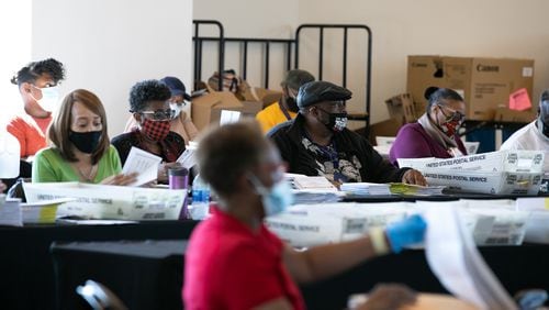 Election workers count Fulton County ballots at State Farm Arena on November 4, 2020 in Atlanta, Georgia. (Jessica McGowan/Getty Images/TNS)