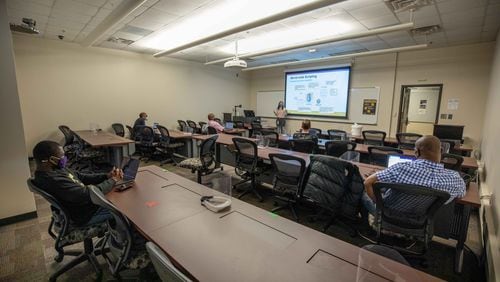 Kennesaw State University Professor Dr. Maria Valero teaches a socially distanced Information Technology class in Marietta. (BRANDEN CAMP FOR THE ATLANTA JOURNAL-CONSTITUTION)