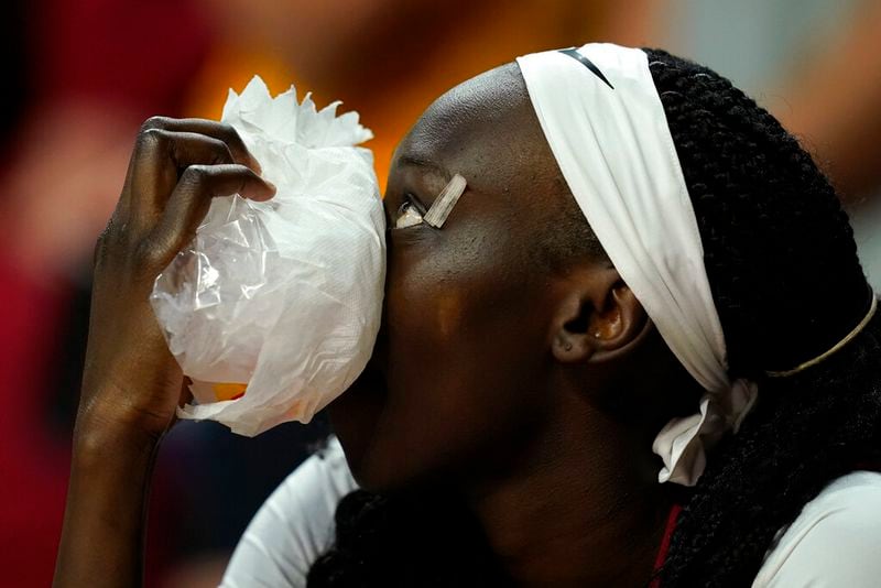 Iowa State forward Nyamer Diew watches from the bench after getting injured during the second half of a second-round game against Georgia in the NCAA women's college basketball tournament, Sunday, March 20, 2022, in Ames, Iowa. Iowa State won 67-44.(AP Photo/Charlie Neibergall)