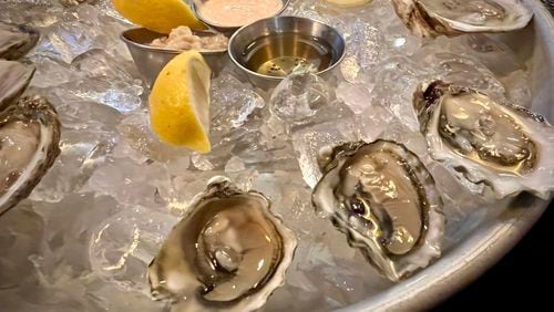 Mac's Raw Bar on Marietta Square serves a good selection of raw oysters. Henri Hollis/henri.hollis@ajc.com