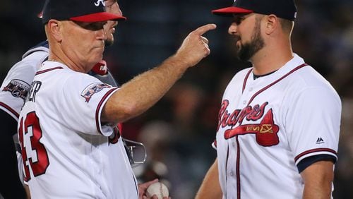 Brian Snitker, here making a pitching change in his second week as interim manager in May, has been hired as the Braves’ permanent manager after steering a midseason turnaround in the team’s performance. (Curtis Compton/AJC file photo)